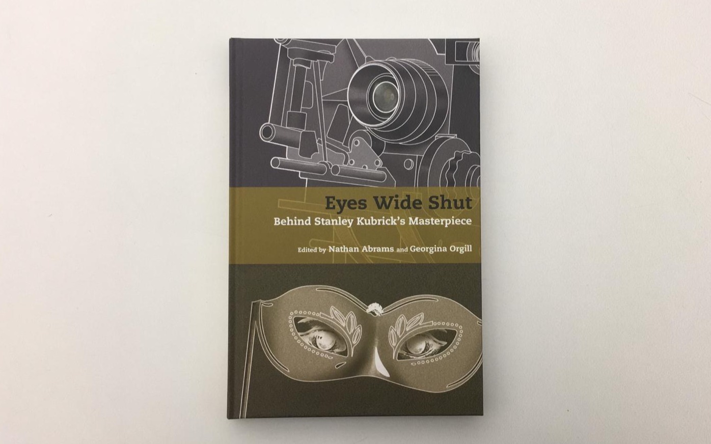 Photograph showing a copy of the book 'Eyes Wide Shut: Behind Stanley Kubrick's Masterpiece' Edited by Nathan Abrams and Georgina Orgill