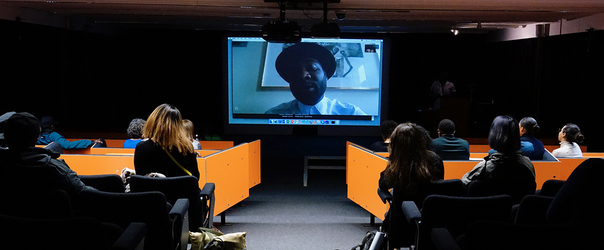 A shot of a skype conversation in a lecture theatre