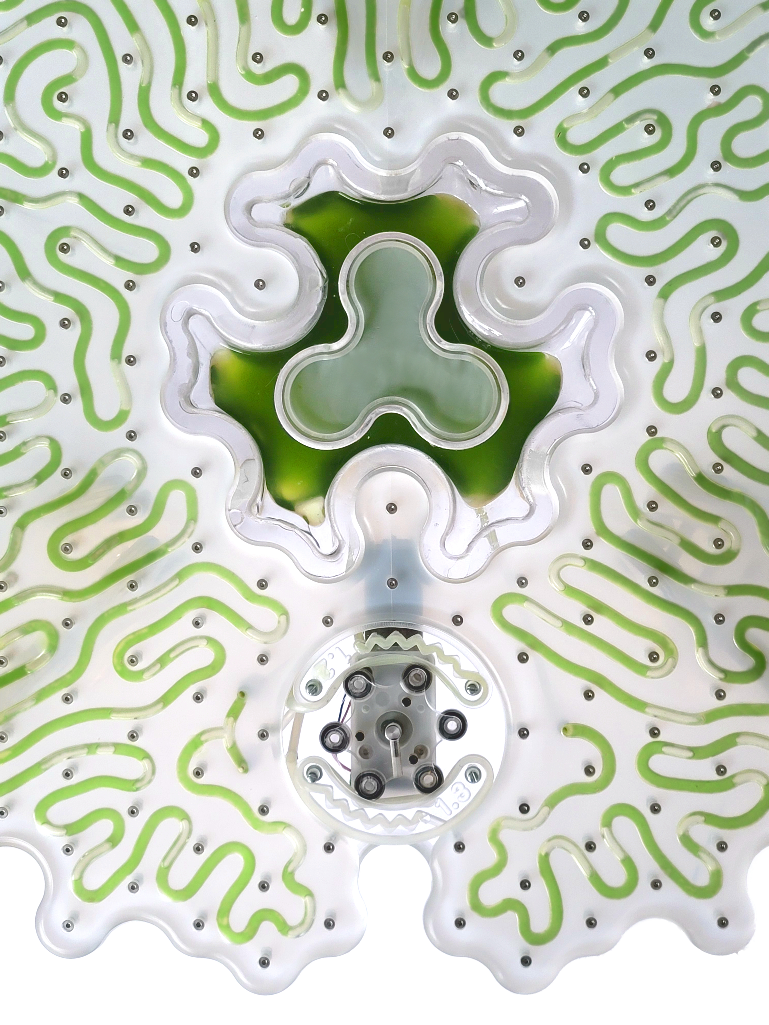 A close up of a white and green panel with shapes and patterns