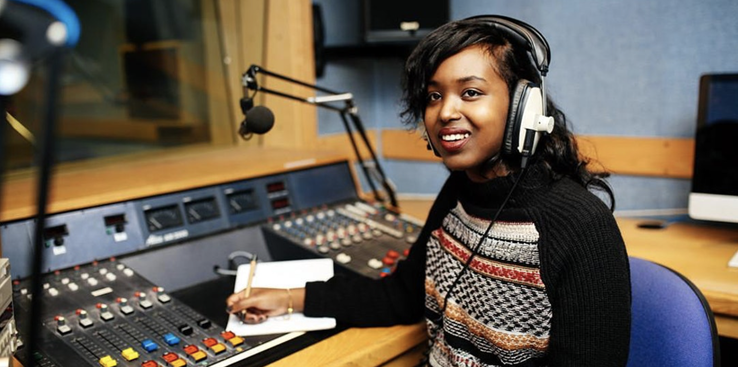 Woman at production/mixing desk
