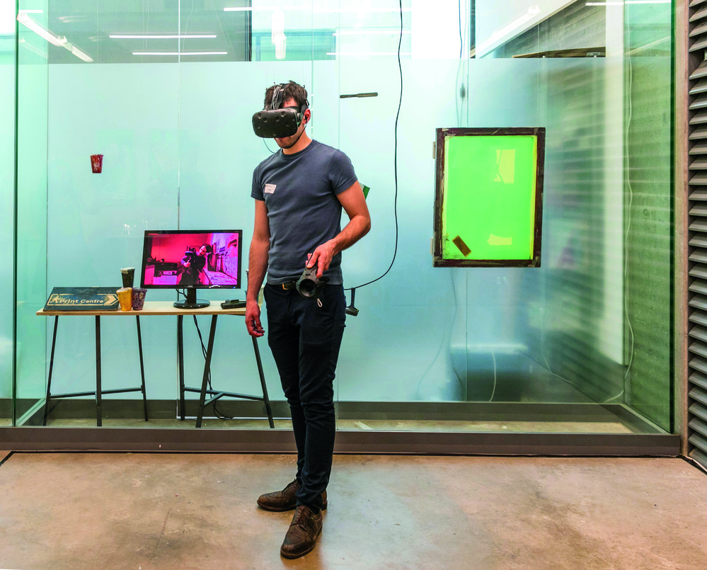 A man wearing a Virtual Reality headset