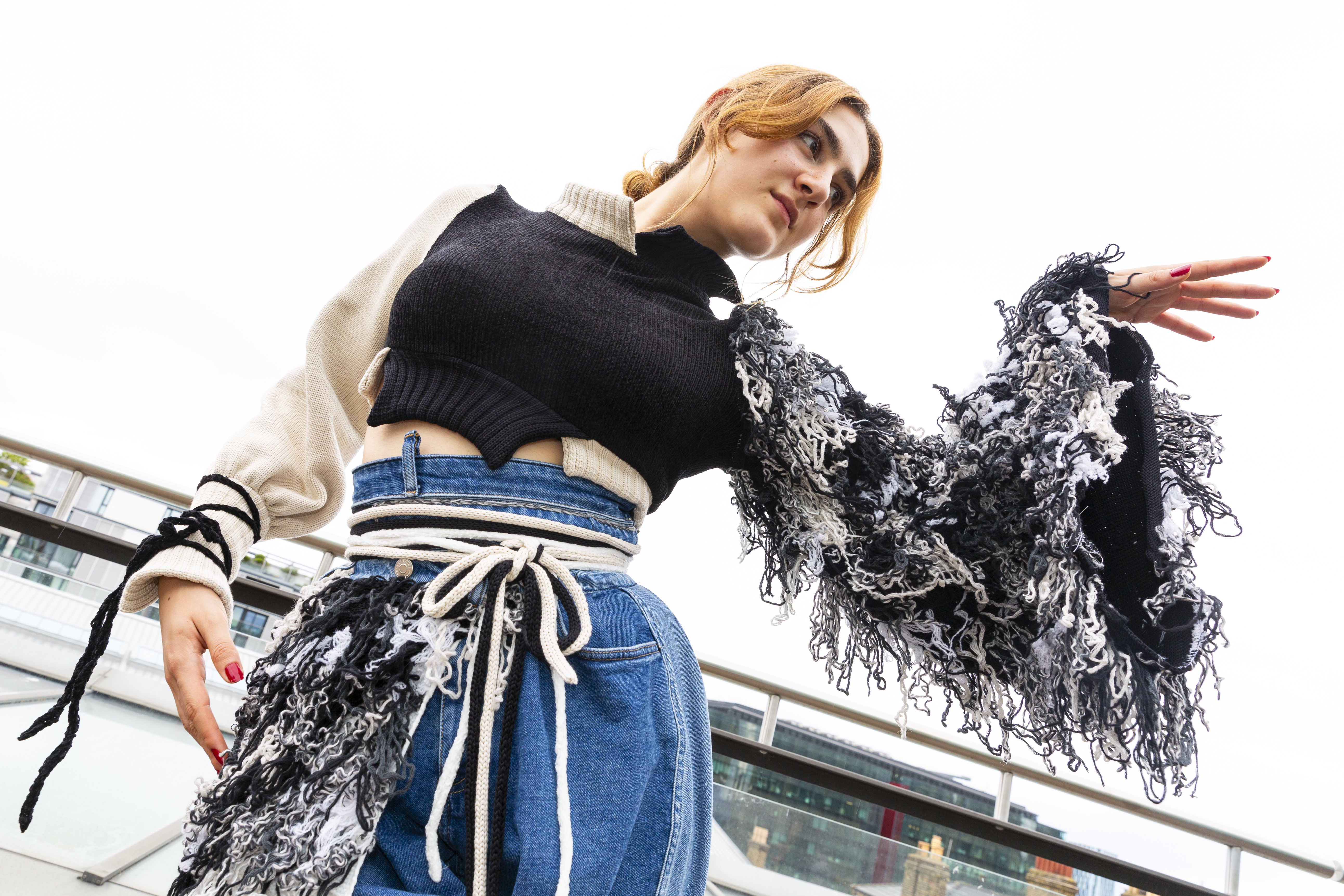 Image of model wearing a knitted garment