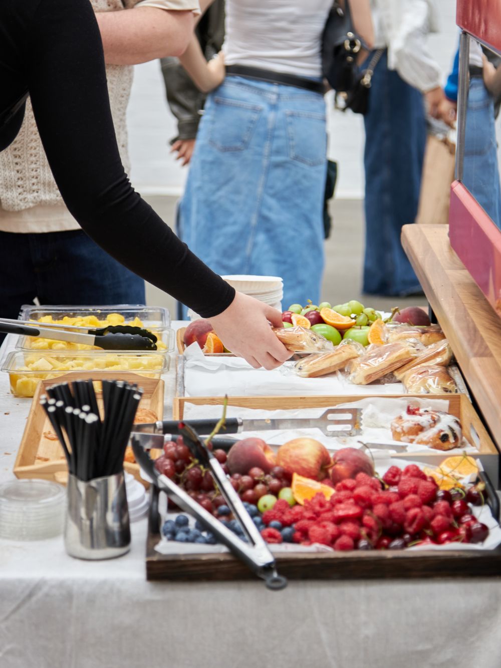 Breakfast spread of fruits and pasteries