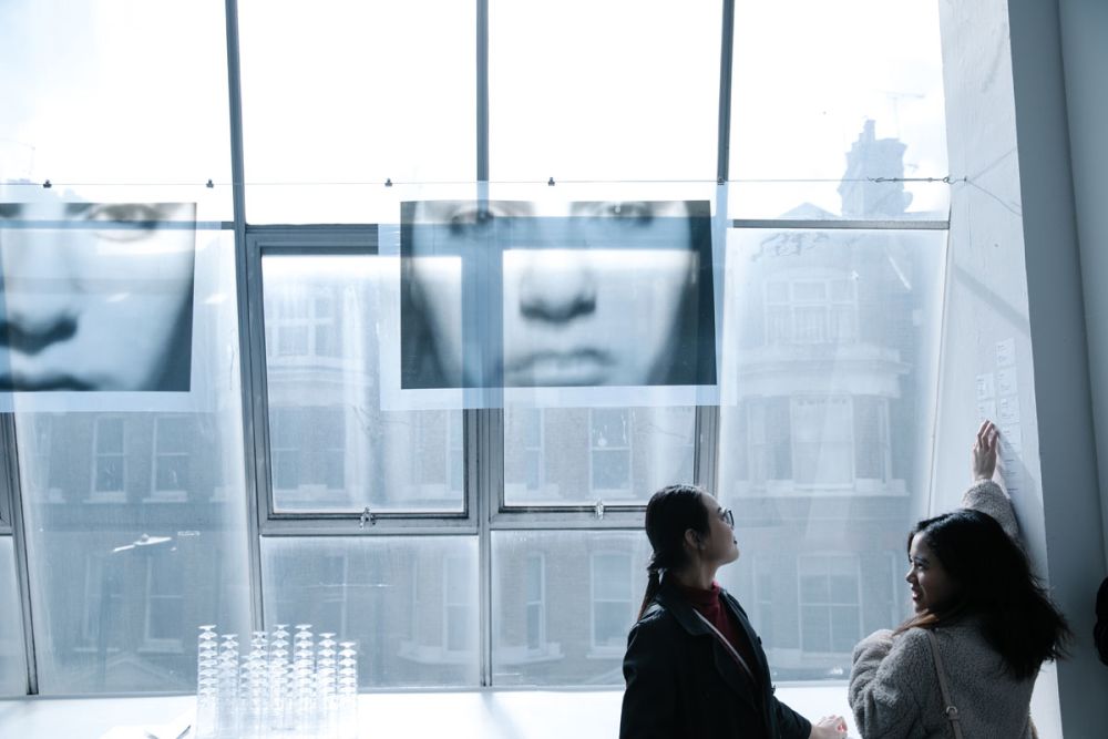students sitting by window