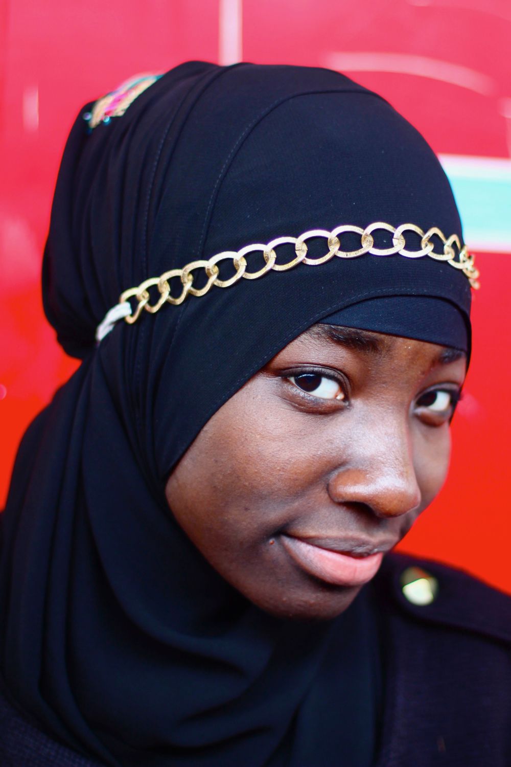 Woman wearing hijab.