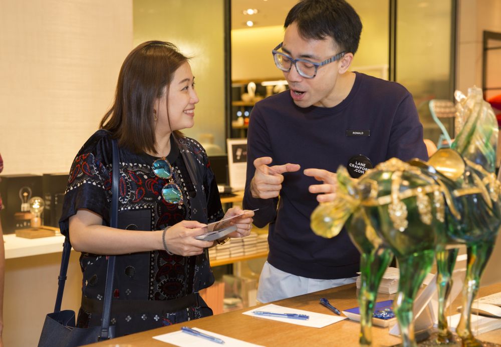 A woman and a man talking