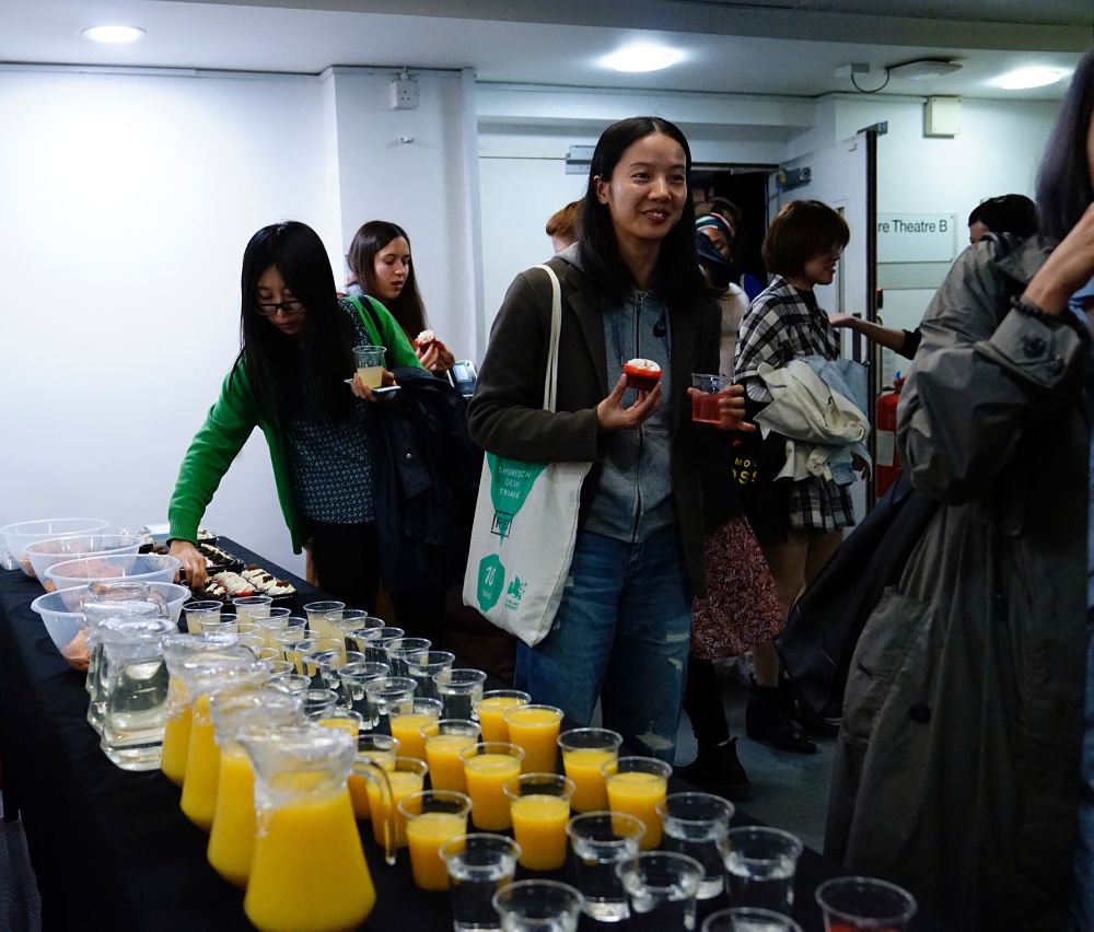 A student holds a cupcake