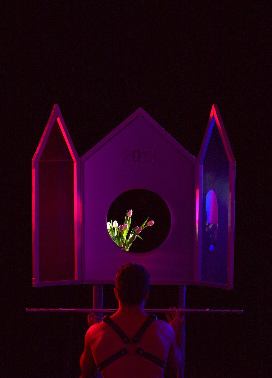 Triptych with person bowing down in front like a memorial