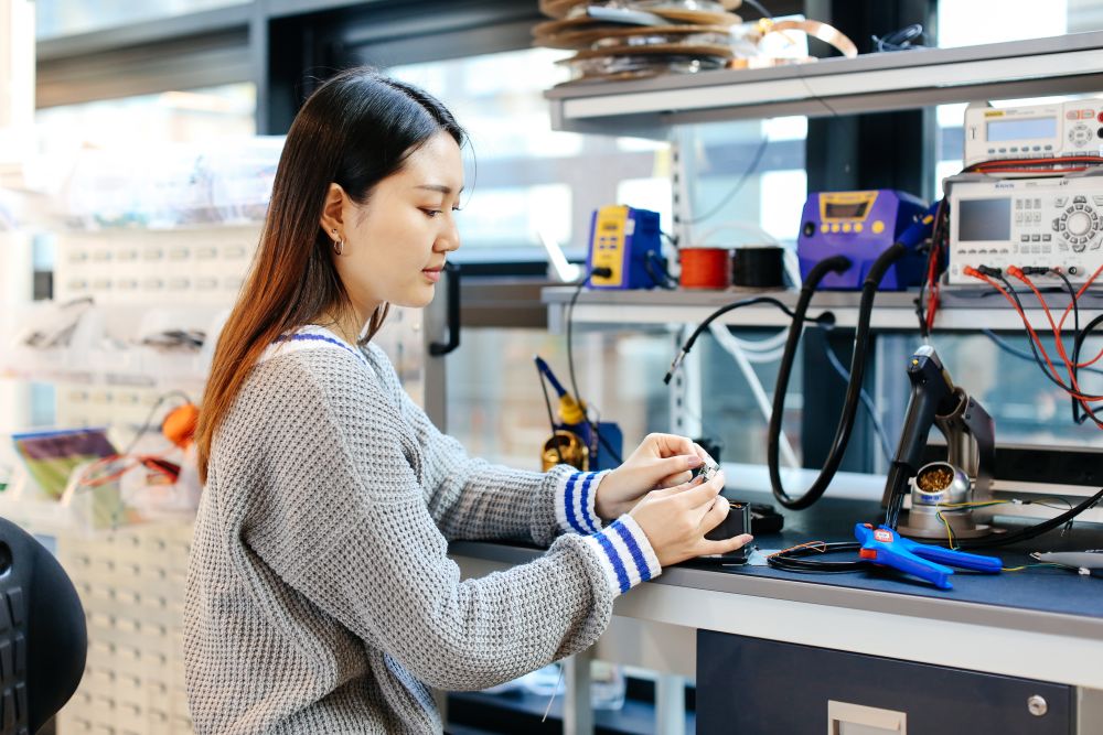 Anna working in the Creative Computing Institute.