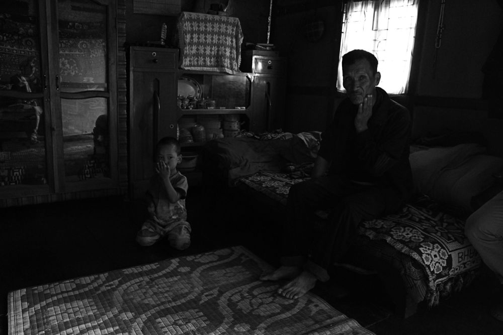 Dark image of Sachi Patil working