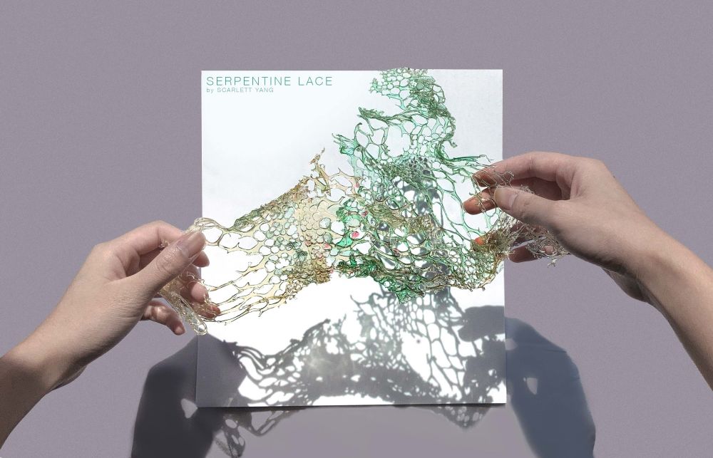Hands holding liquid-like material