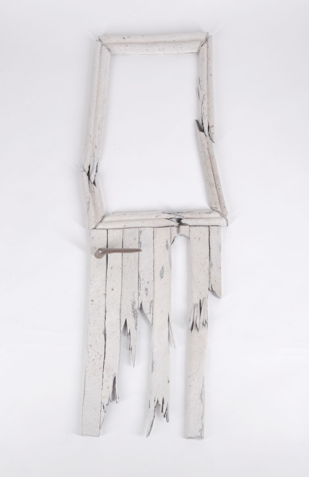 pale wash broken wood artefact with small handle