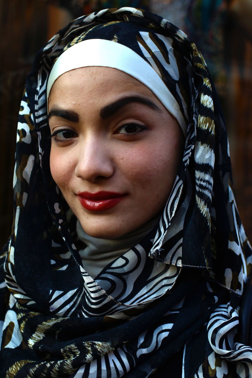 Woman wearing hijab.