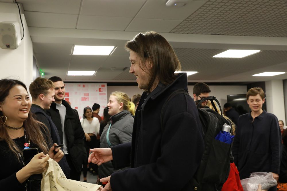 Course Leader Paul Baiuley laughing with students.