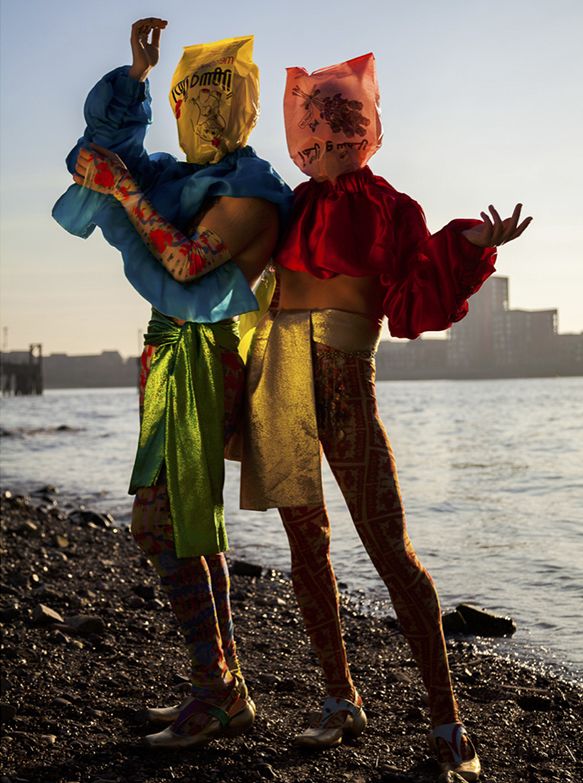 Models wearing multicoloured outfits