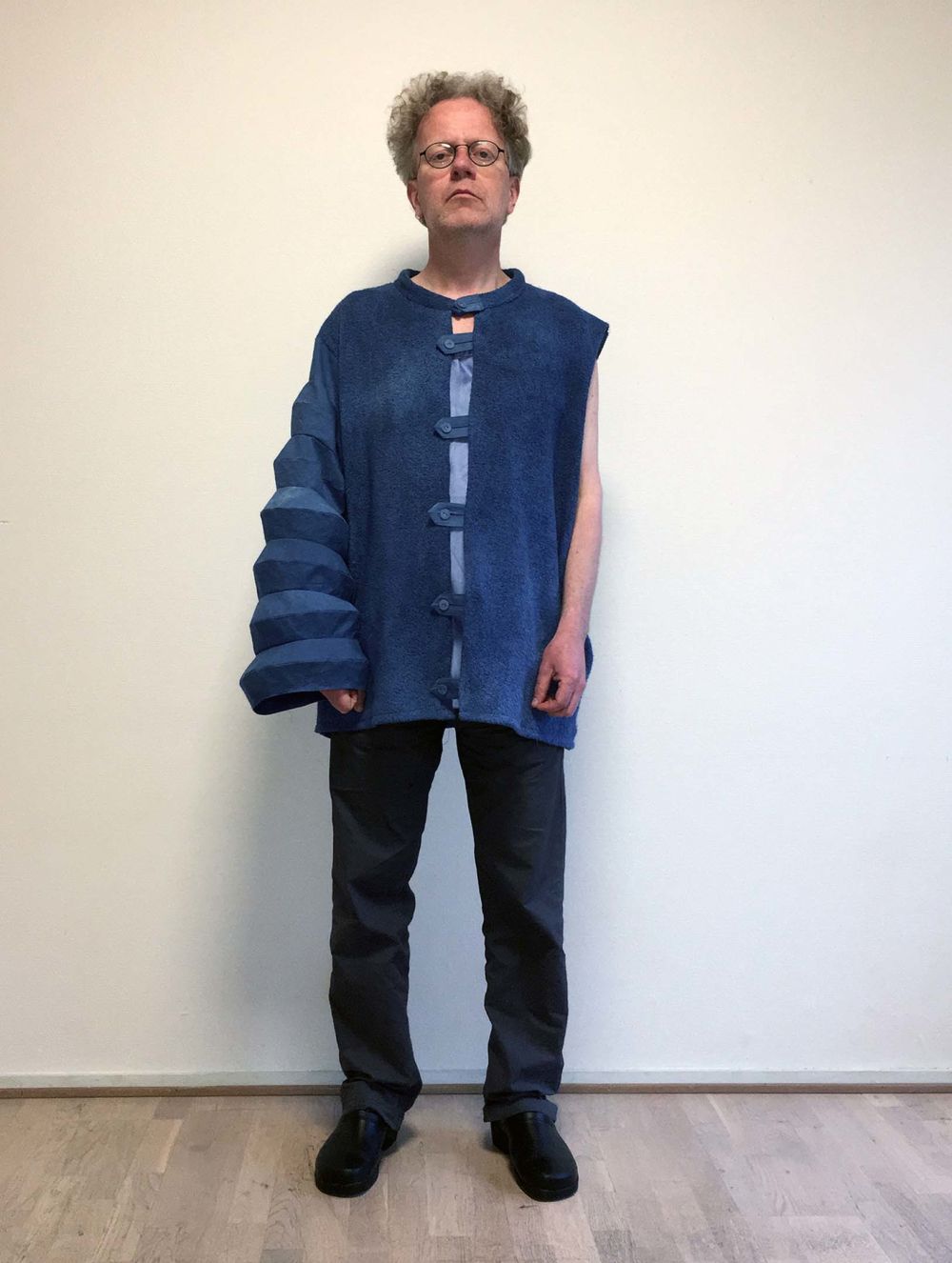 Man wearing blue top