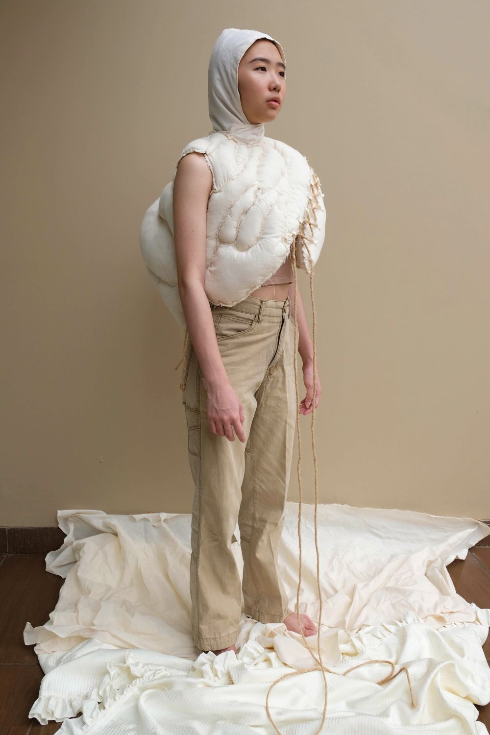 Persons wearing accentuated white form on torso and head