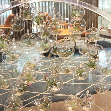 Close-up of a glass bauble sculpture made for QBE by LCC students.