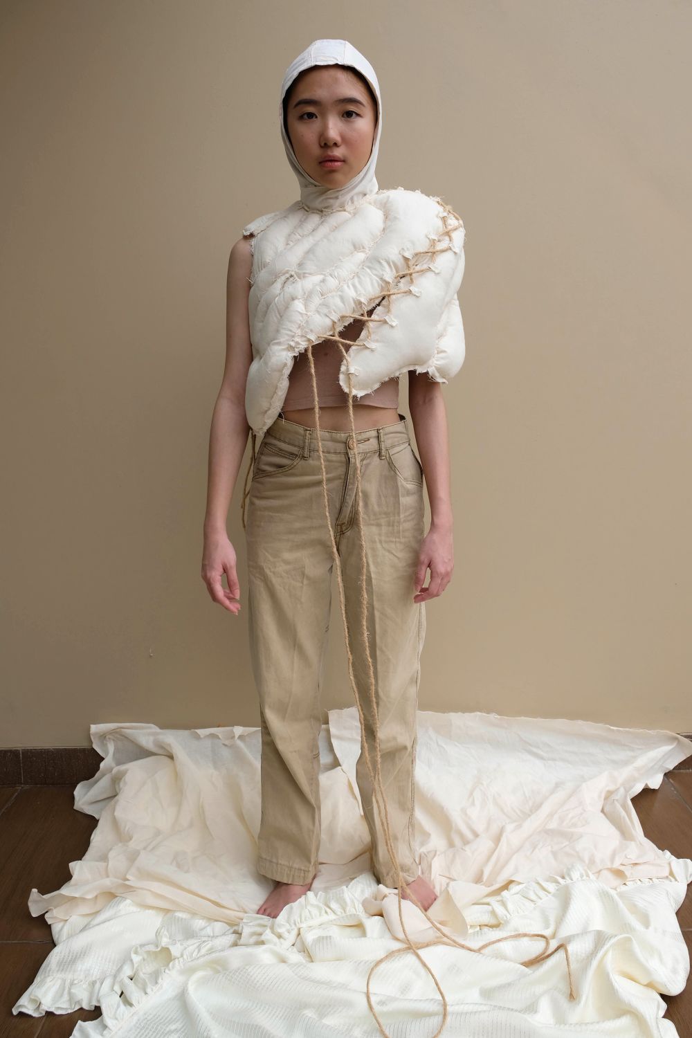 Persons wearing accentuated white form on torso and head