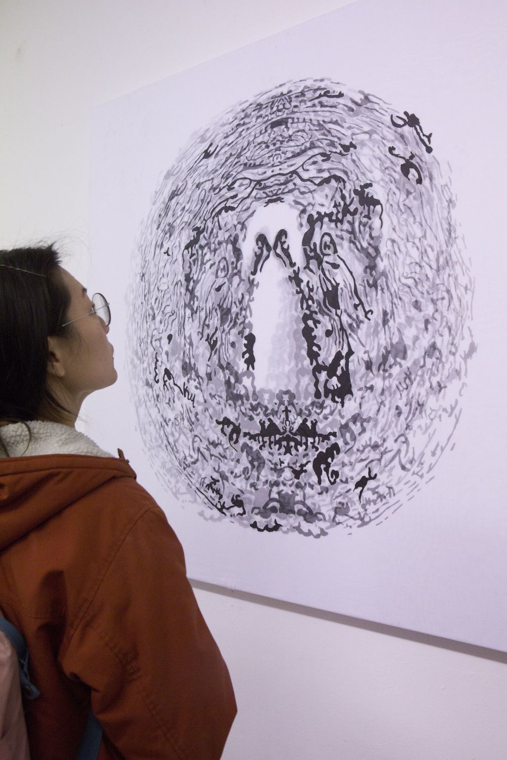 Woman looking at drawing