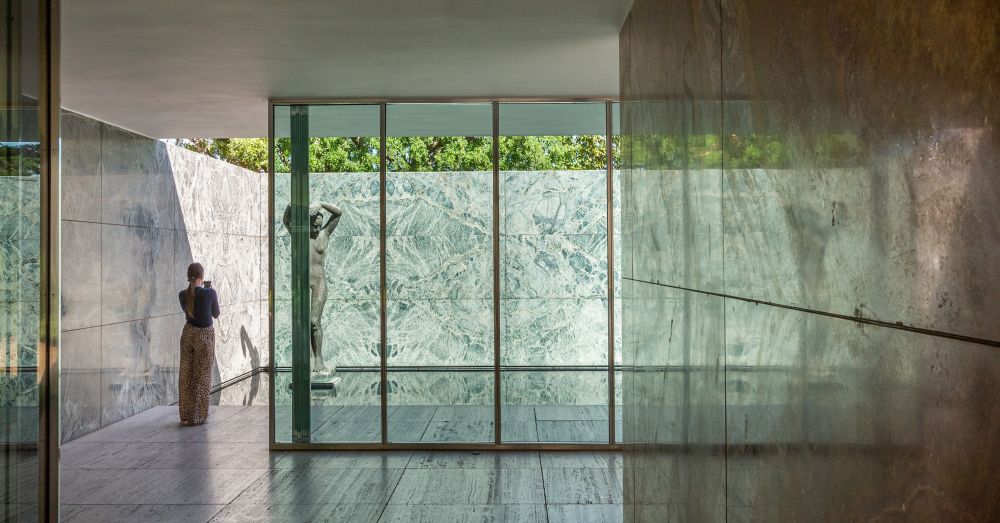 figure stood behind a glass window