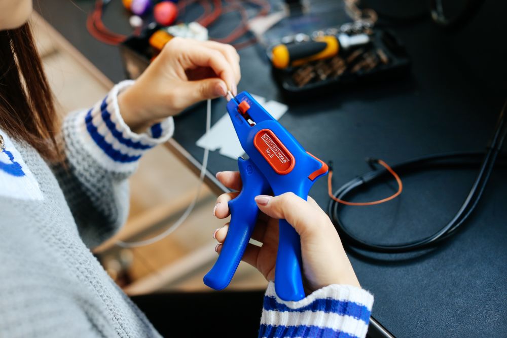 Anna working with tools.