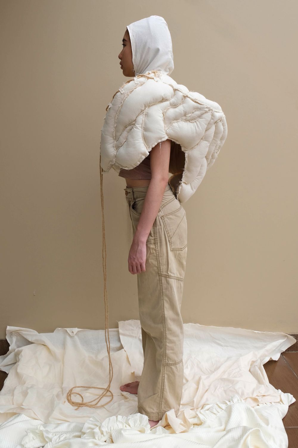 Persons wearing accentuated white form on torso and head