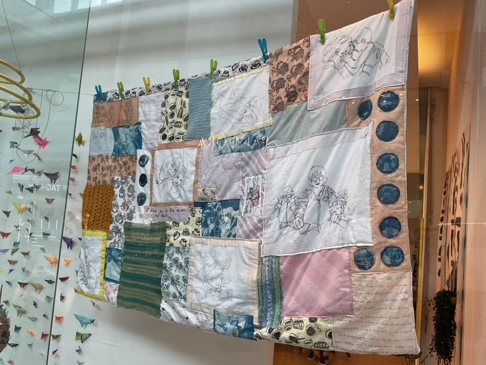 hanging textile piece with patchworks