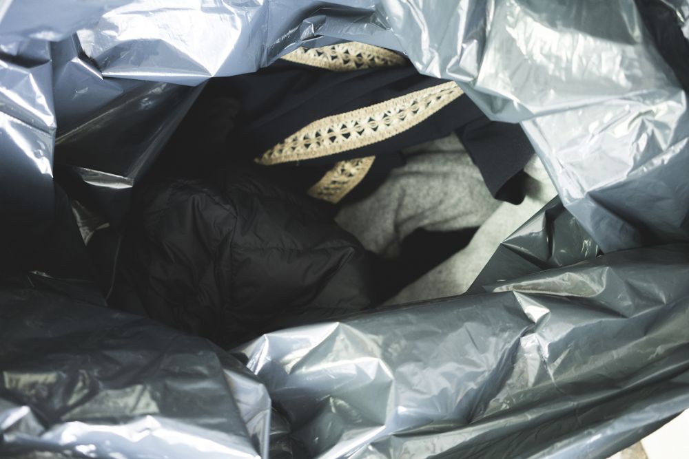 clothes in black bag