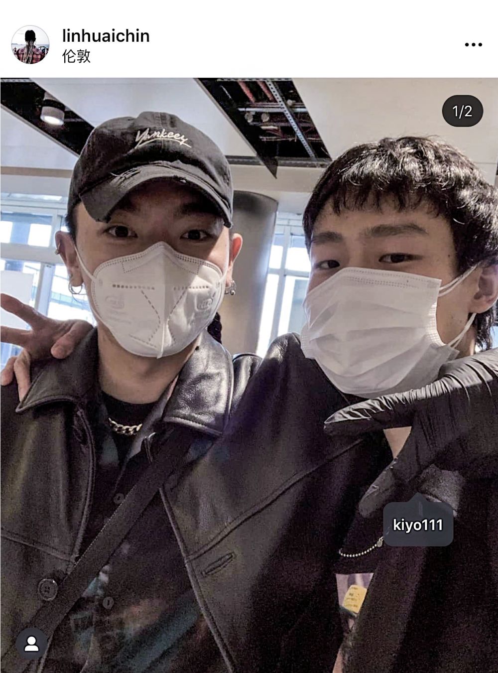 two asian men wearing masks