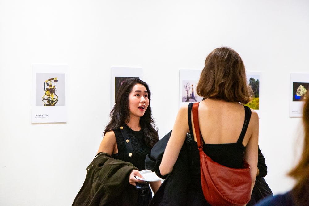 Students gathered in the gallery space
