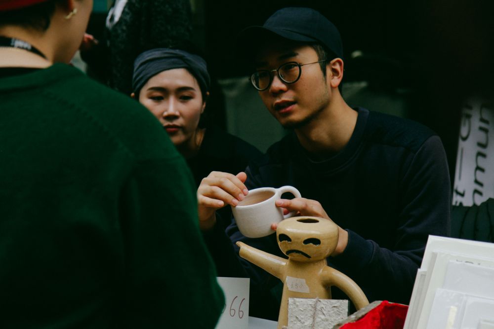 Holiday Market vendors and buyers in The Street CSM
