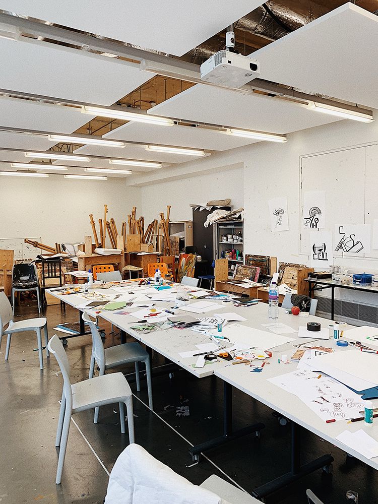 100 Design Projects studio, work on table.