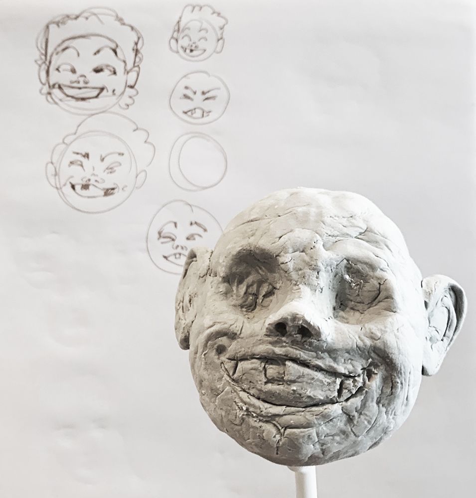 Modelled head in clay.
