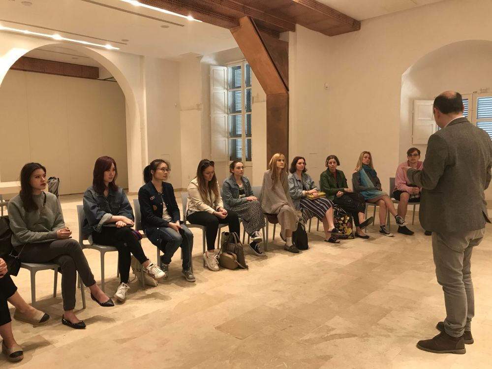 Students listening to talk being given as part of the project