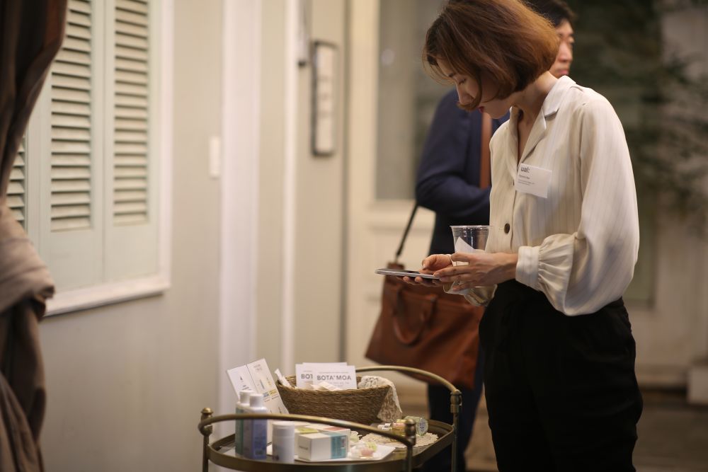 Alumna setting up her exhibit