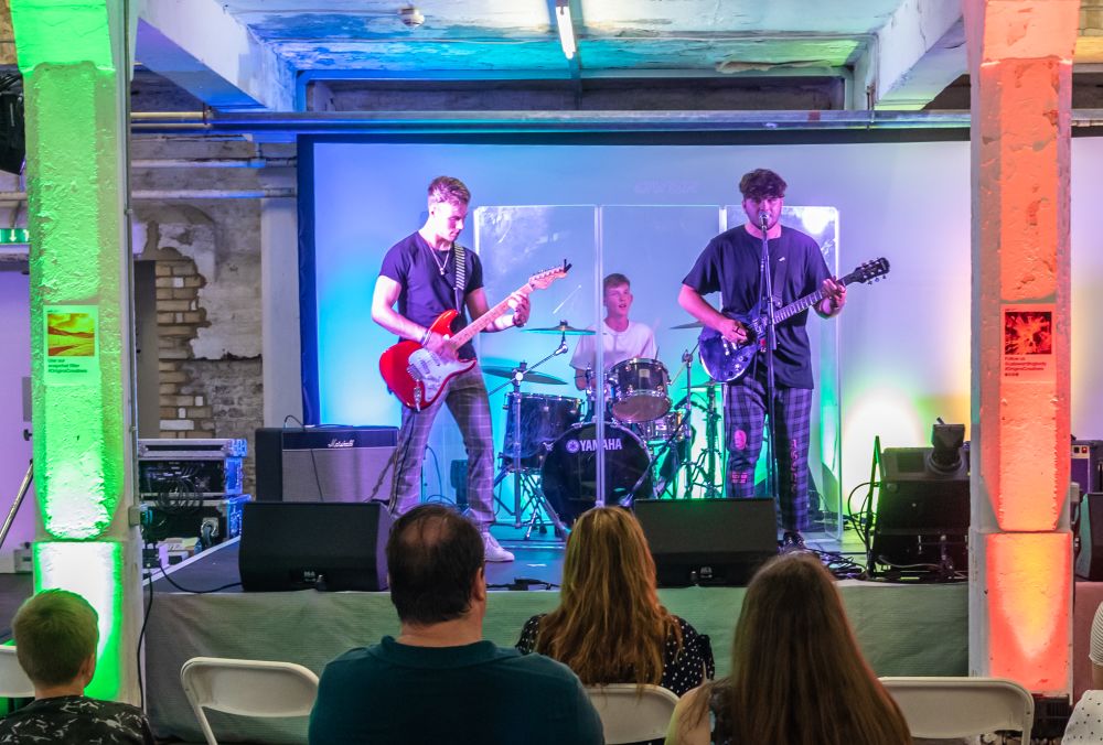 A band plays to entertain private view guests