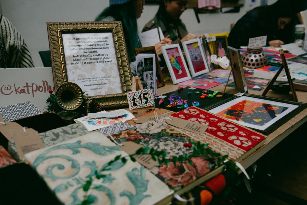 Holiday Market vendors and buyers in The Street CSM