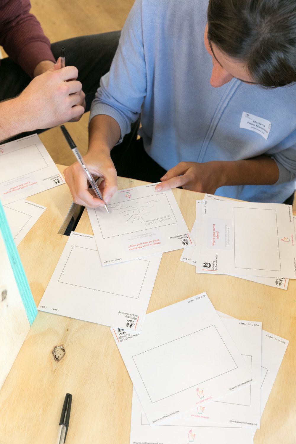 Lend with Care - Tate Exchange Event - image of a woman writing letters