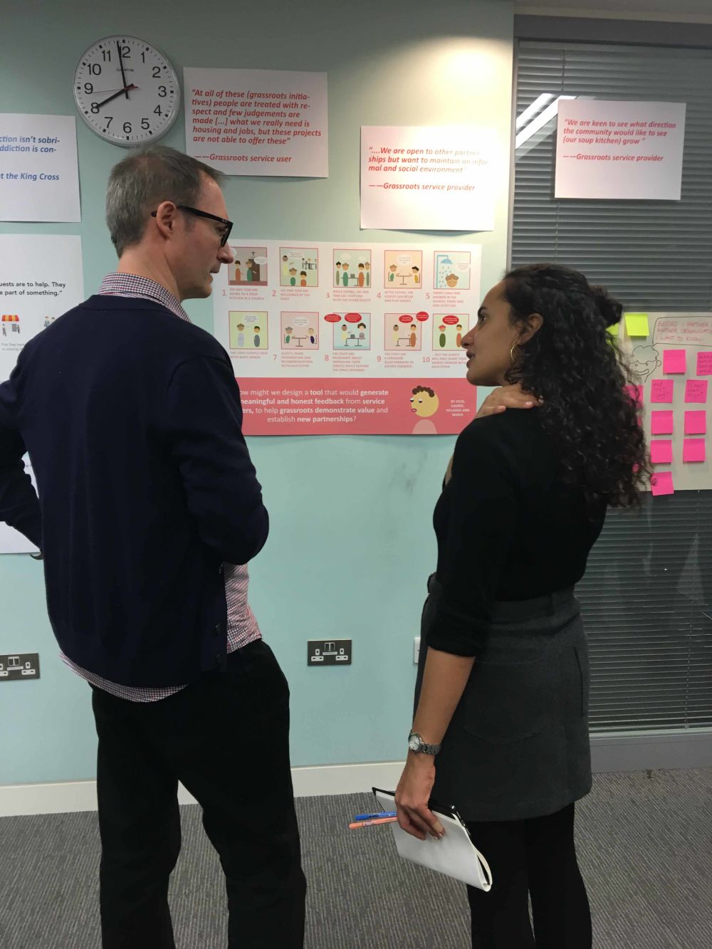 Student discussing Rough Sleeping in Camden project with visitor