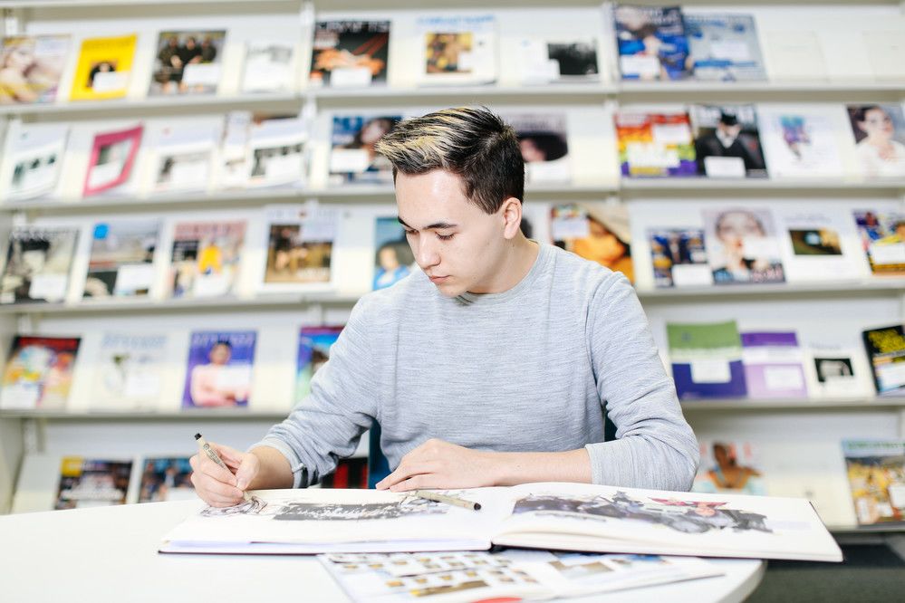 Jeffrey Thomson working in the Library