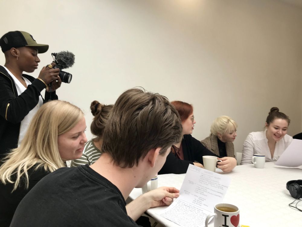 BA (Hons) Design for Art Direction students sitting together working on project