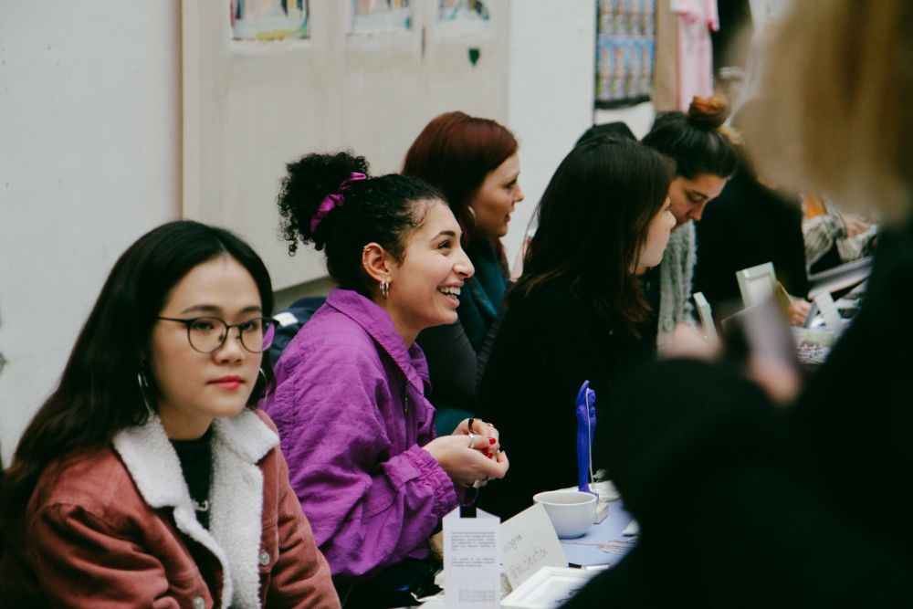 Holiday Market vendors and buyers in The Street CSM
