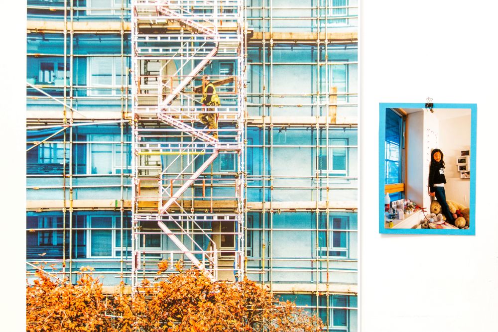 Photograph of a building with blue scaffolding
