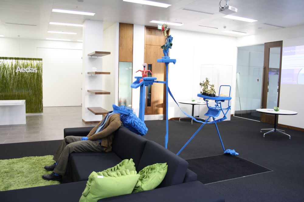 Image of an installation / intervention Charlie curated by artist Matt Robinson in the Birmingham Aedas architects office entrance / visitor space, 2011.