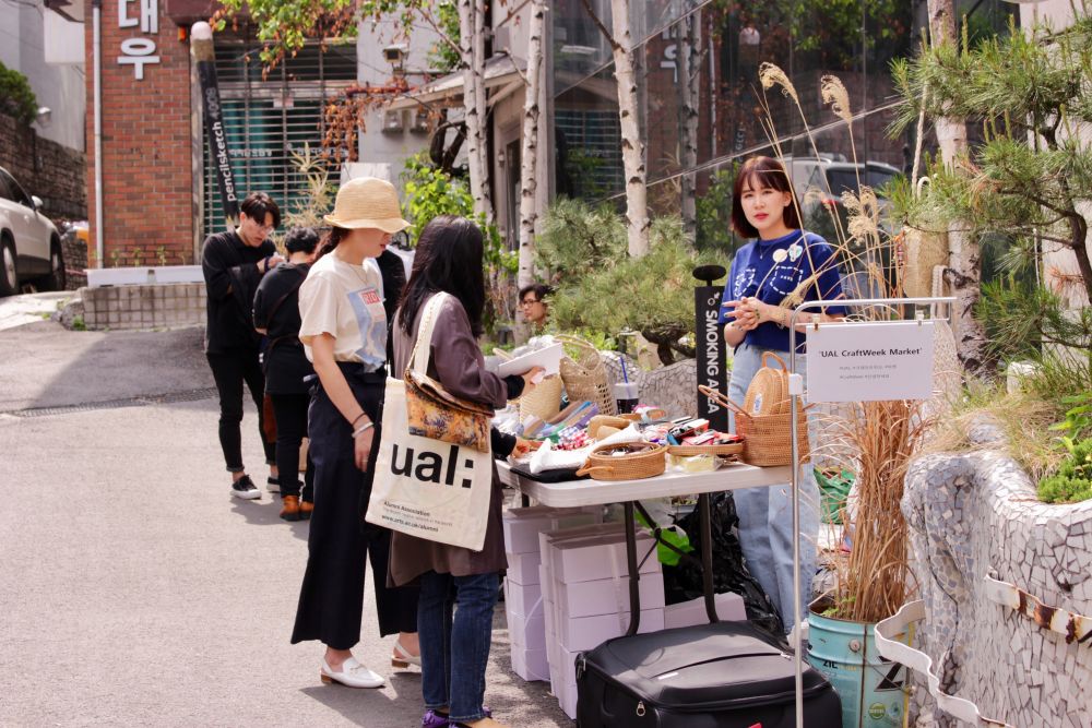 People looking at a stall