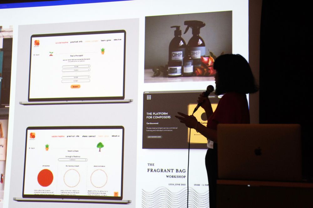 alumni presenting their work at the alumni event
