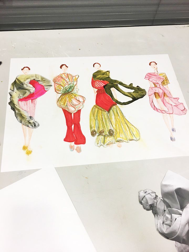 Mandula Pap's illustrated outfit designs.