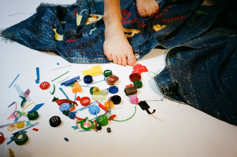 An array of plastic lids