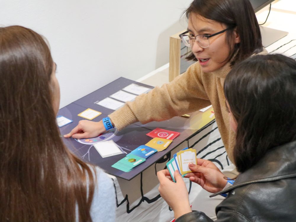 Artist explaining artwork to guests